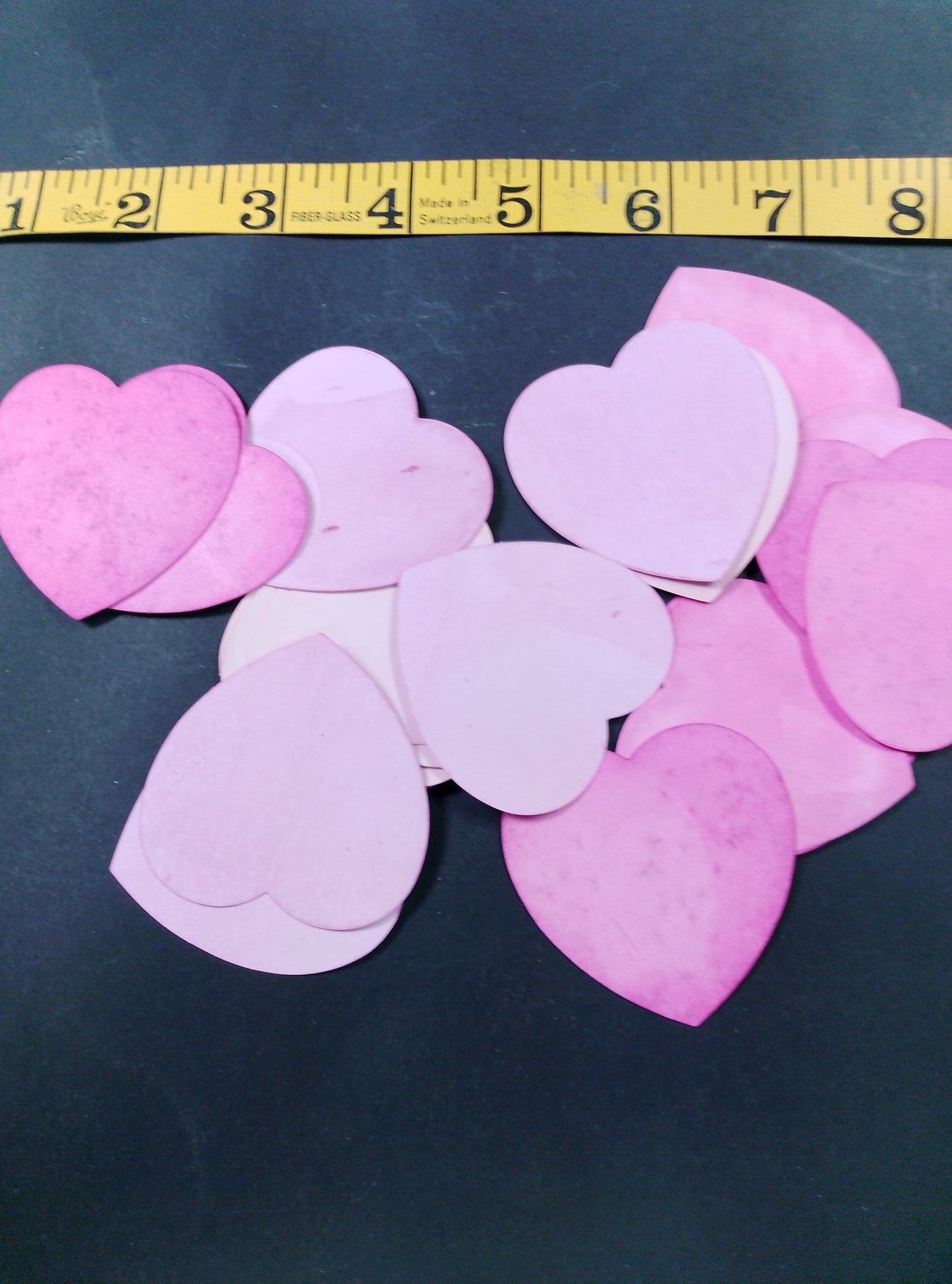Hearts hand dyed in shades of pink. 20 in each bag