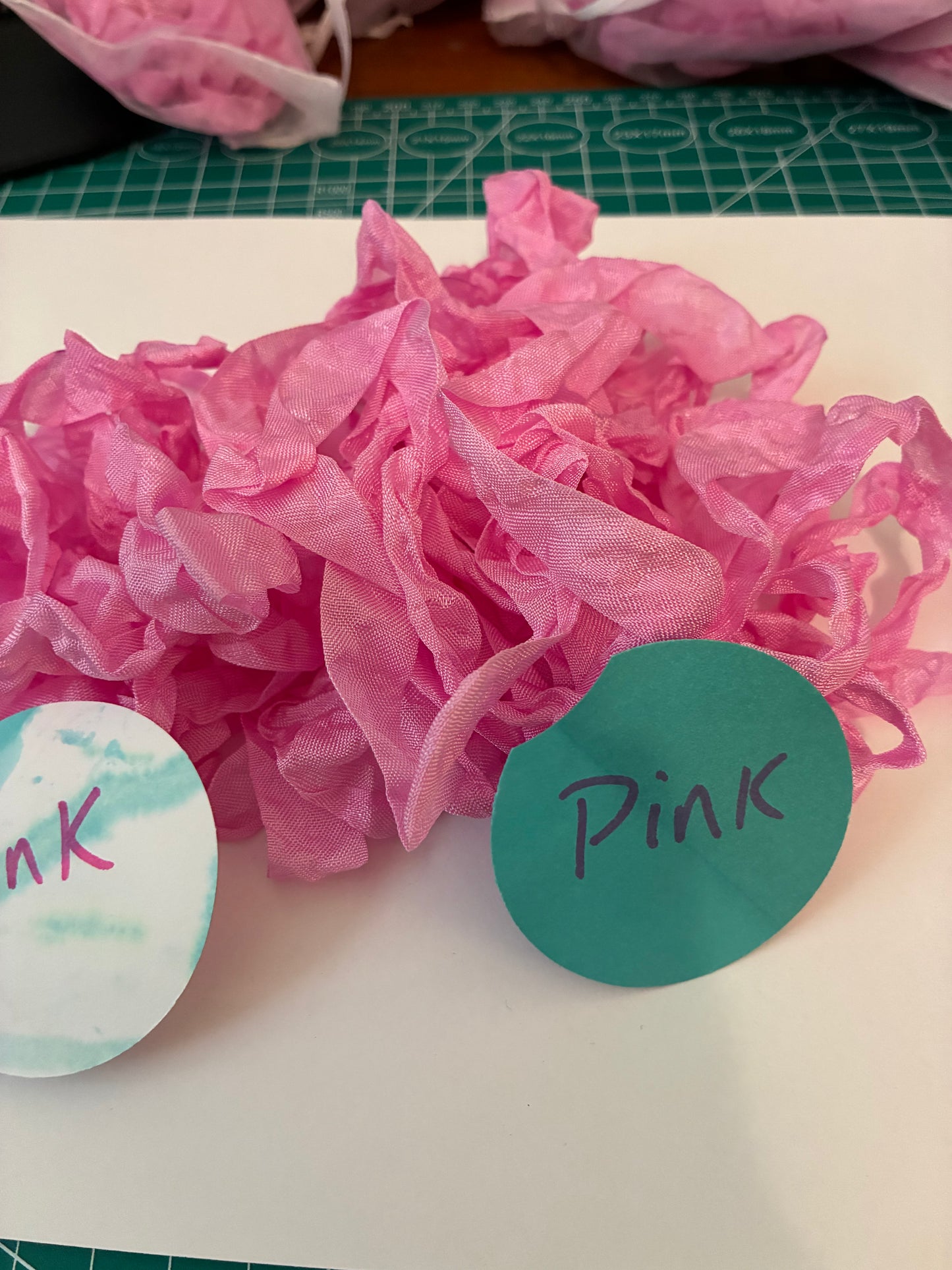 Pretty in Pink seam binding.  5-yards uncut crinkled seam binding in re-useable white mesh bags.