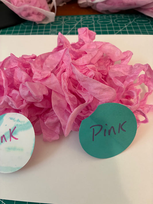 Pretty in Pink seam binding.  5-yards uncut crinkled seam binding in re-useable white mesh bags.