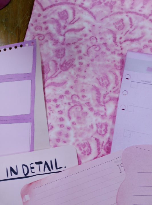 Tricia's Pretty Paper Packs in the color Watermelon 🍉.  At least 10 different papers and sometimes a coffee filter and always my designer papers.